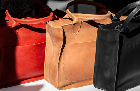 Three Women's Leather Handbags on direct sunlightの写真素材
