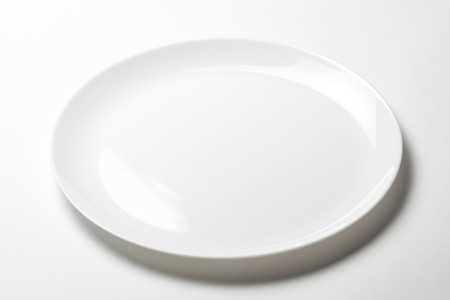 Whte plate without print on white background