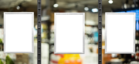 Empty advertising boards in liquor store showcase. Glassy showcase on the street. Background for mockupの写真素材