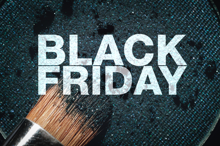 Black friday poster. Macro eyeshadow refill and brush.の写真素材
