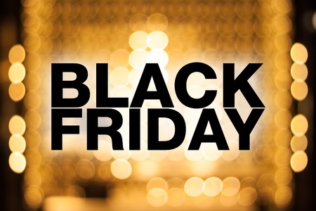 Black friday poster. Gorgeous golden blurry background. Sale bannerの写真素材