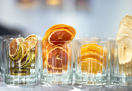 Dried fruit slices in glasses. Fruit Chips close-upの写真素材