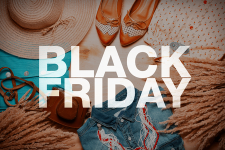 Black friday poster. Modern women outfit on backgroundの写真素材