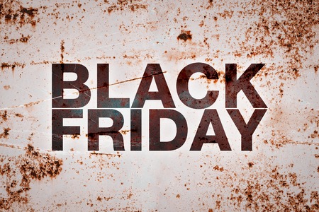 Black friday poster. Inscription on rusty metal surfaceの写真素材