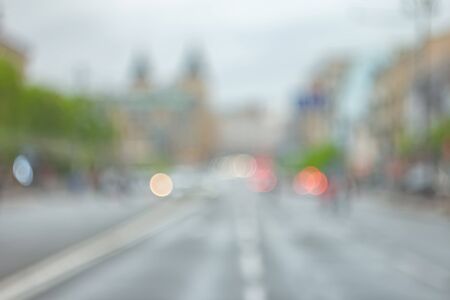 Misty town. Cloudy defocused cityscape at eveningの写真素材