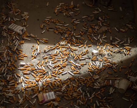 Kyiv, Ukraine, June 8, 2019. Lots of cigarette butts on the floorのeditorial素材