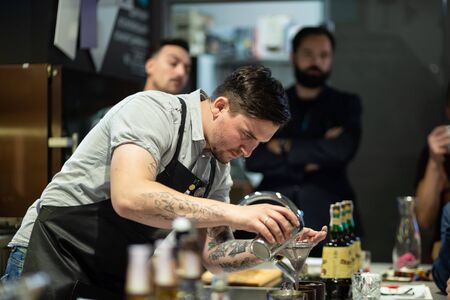Kyiv, Ukraine, October 19, 2018. Barman preparing a cocktail on Bar Spirit Cup '18 international bar showのeditorial素材