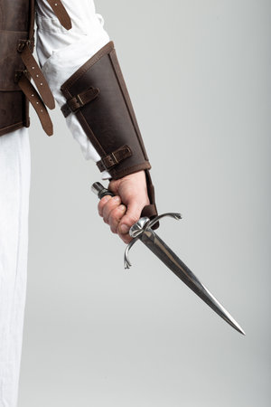 Hand holding a dagger