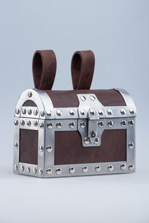 Small Brown Treasure Chest with Metal Fittingsの写真素材