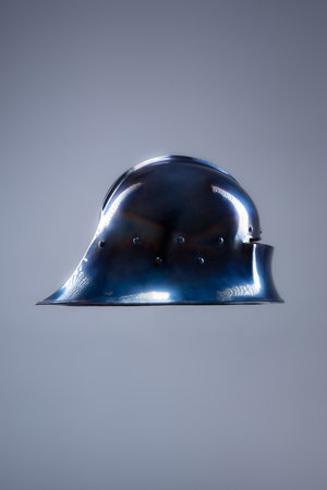 Polished Steel Sallet Helmet. Sleek medieval head protection with elongated rear.の写真素材