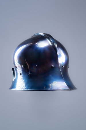 Polished Steel Sallet Helmet. Sleek medieval head protection with elongated rear.の写真素材