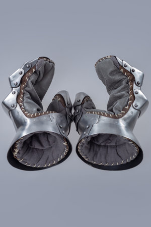 Pair of Silver Steel Gauntlets with Leather Interior. This image shows a pair of shiny silver steel...