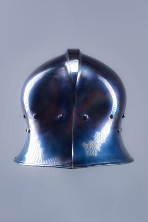 Polished Steel Sallet Helmet. Sleek medieval head protection with elongated rear.の写真素材