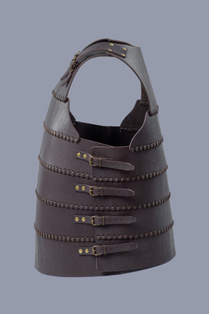 Brown Leather Medieval Torso Armor with Buckles. This brown leather cuirass features adjustable straps and brass buckles, providing torso protection.の写真素材