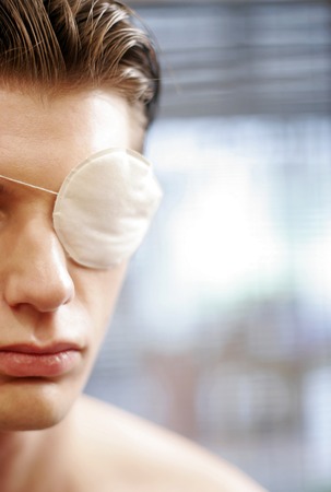 An injured guy with an eye patch on his left eye