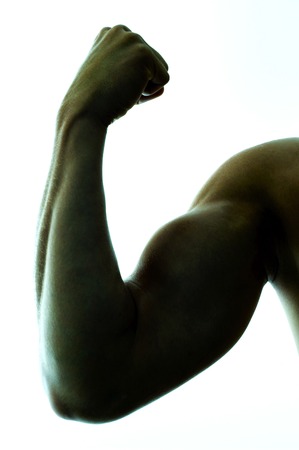 A man showing his muscular armの写真素材