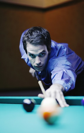 Man playing snooker