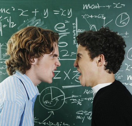 Two boys arguing in the classroom
