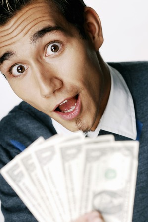 Man in shock with money