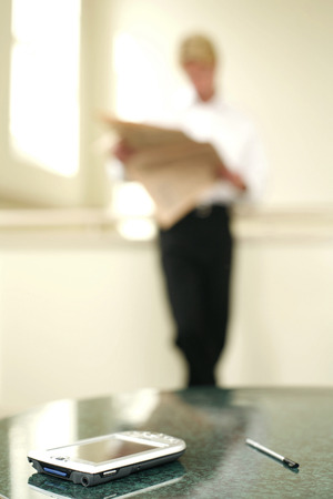 Businessman reading the newspaperの写真素材
