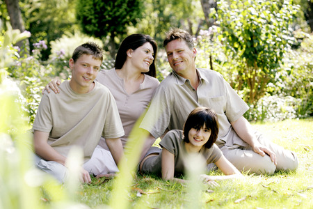 Parents and children posing in the park