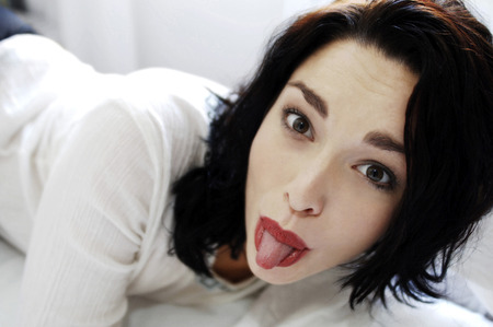 Woman sticking out her tongue