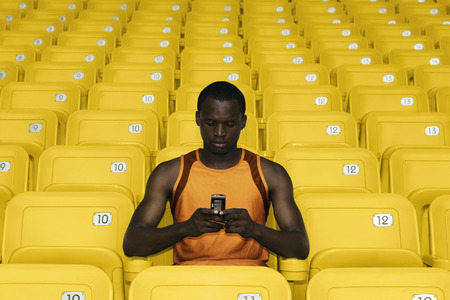 Man text messaging on the phone
