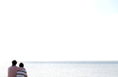 Two men at the beachの写真素材