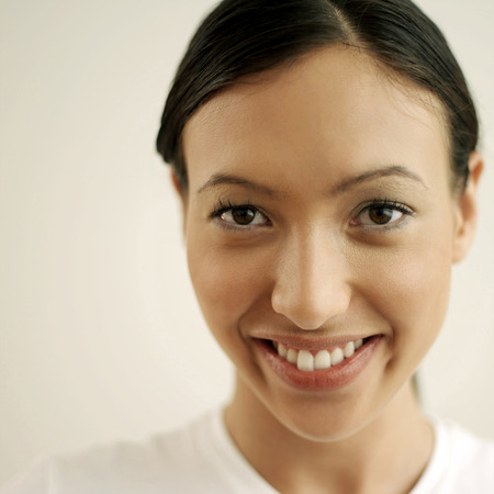 Woman smiling at the cameraの写真素材