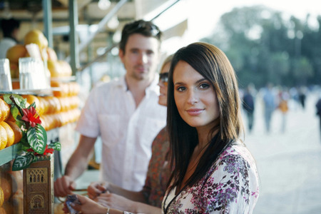 Couple at beverage stallの写真素材