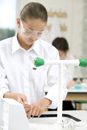 Girl washing her handの写真素材