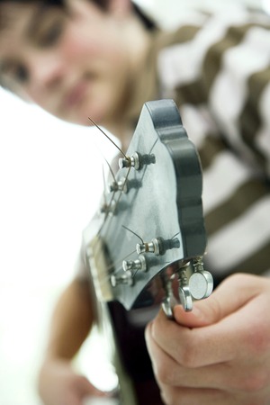 Boy playing guitar