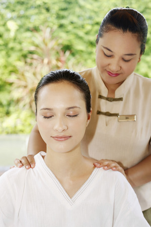 Woman enjoying a body massageの写真素材