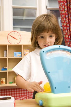 Girl playing with toyの写真素材