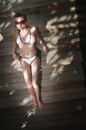 Woman in bikini relaxingの写真素材