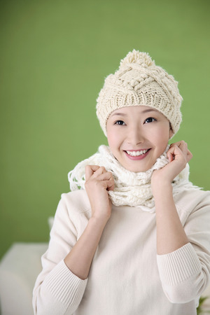 Woman in warm clothingの写真素材