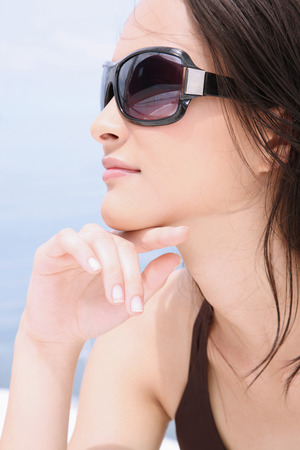 Woman on yacht, sunbathingの写真素材