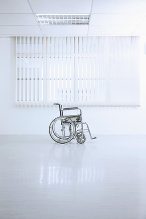 Wheelchair at the hospital walkwayの写真素材