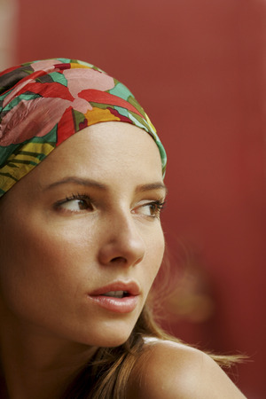 A fashionable looking lady with a headbandの写真素材