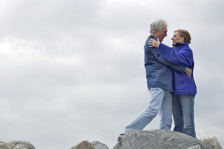 A mature couple embracing each otherの写真素材