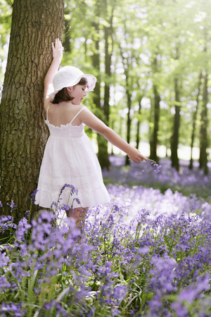 Girl with wildflowerの写真素材