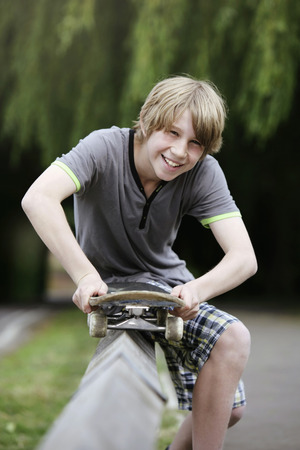 Boy with skateboardの写真素材