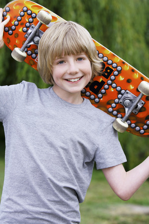 Boy with skateboardの写真素材