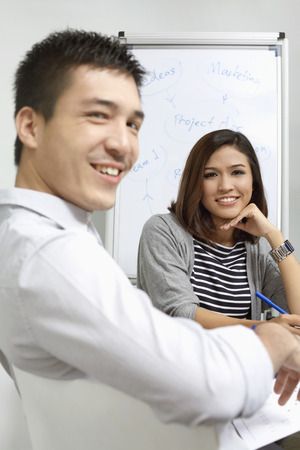 Business people smiling at the cameraの写真素材