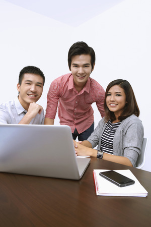 Business people smiling at cameraの写真素材