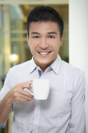 Businessman having a drinkの写真素材