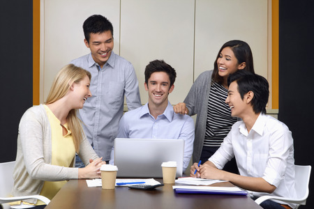 Business people in the midst of having a discussionの写真素材