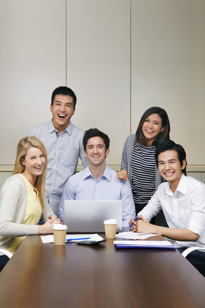 Business people smiling at the cameraの写真素材