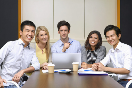 Business people smiling at the cameraの写真素材