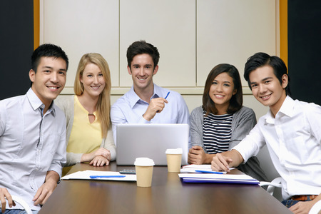 Business people smiling at the cameraの写真素材